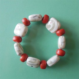 P282 white and orange pillow bracelet