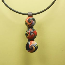 S395 black orange and red 3 swirl bead pendant. £21