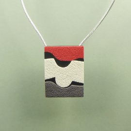 S405 black red white and grey textured pendant. £26
