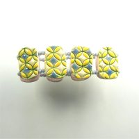 P403 blue yellow and white raised design bracelet