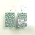 P474 A zig zag pattern in mostly green and blue, with different shaped inserts in sparkly silver and dull blue. The rectangle is 3.5cm long. £5.00