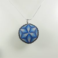 P475 Round pendant with regular black white and blue design £19.00